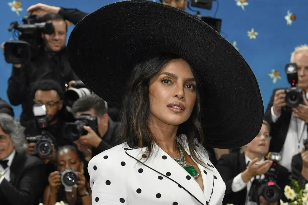 Priyanka Chopra attends the Met Gala 2025 wearing the Bvlgari Magnus Emerald necklace with a 241.06-carat Colombian emerald from the Polychroma High Jewellery collection