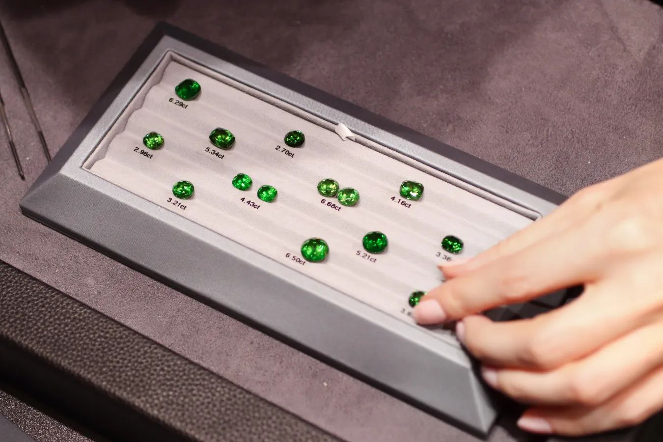 Rare Russian demantoid garnets in large carat weights, presented by Tsarina Jewels