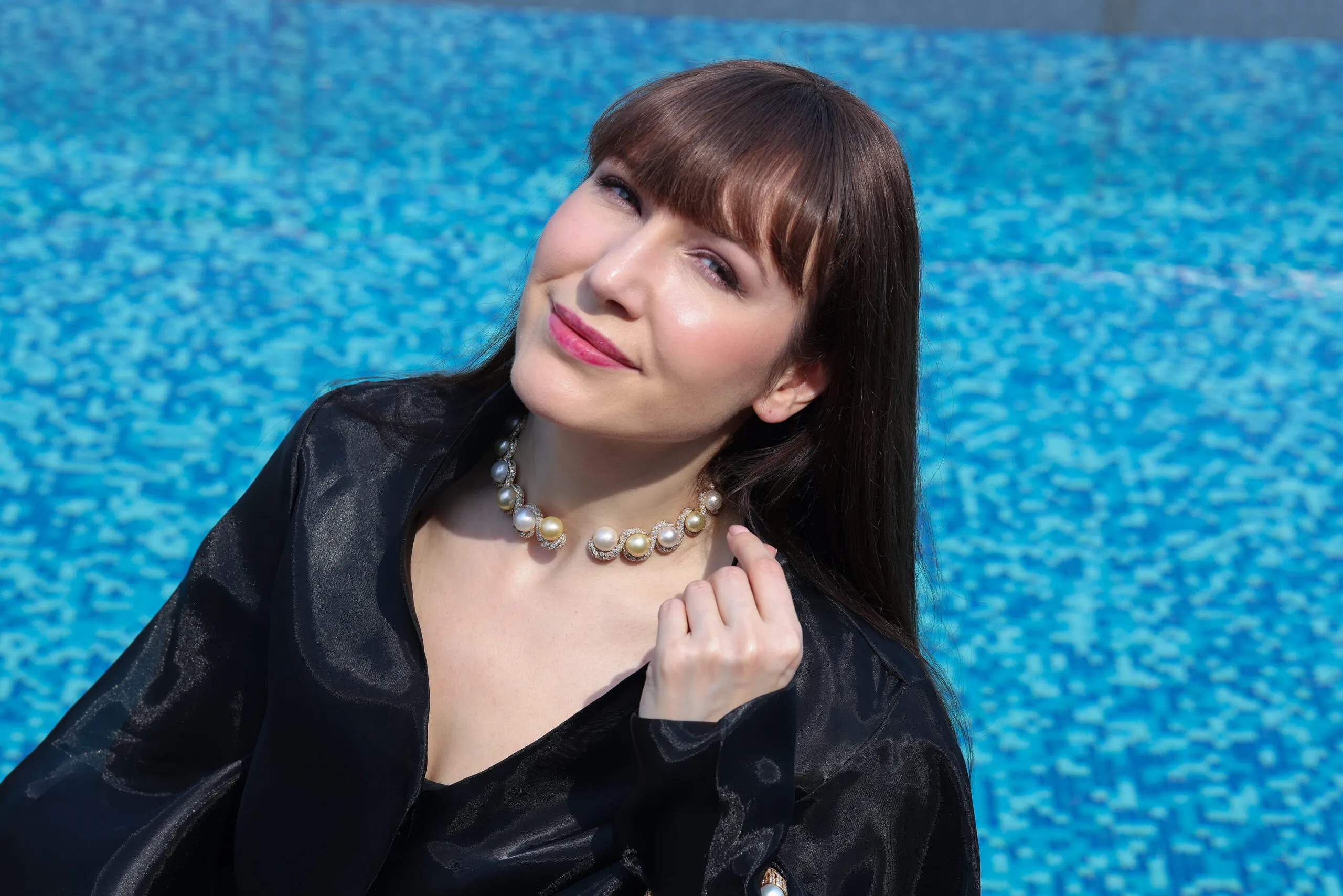 <p>Katerina Perez wears the Luminous Twin collar necklace by Renu Oberoi set with 18.5 carats of diamond swirls surrounding 167.3 carats of golden and white pearls</p>