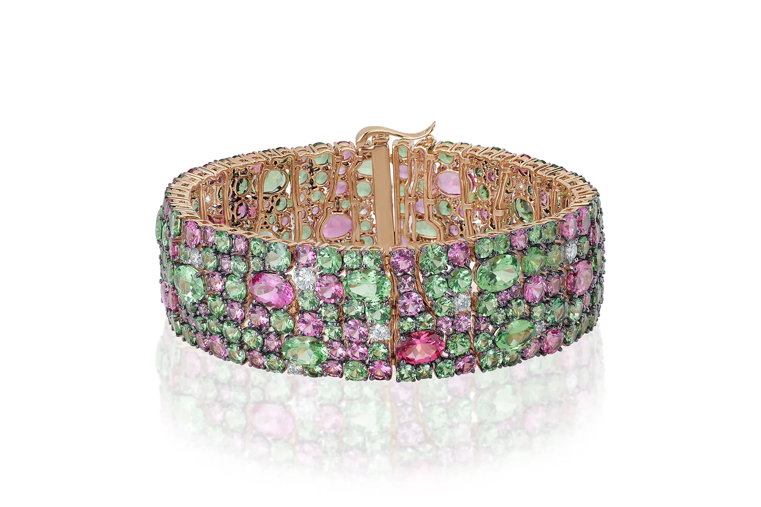 <p>Royal Touch bracelet from the Mosaic collection, set with 18.87 carats of Tanzanian pink spinel, 28.71 carats of mint green tsavorite garnet from Kenya, and 1.22 carats of diamonds</p>
