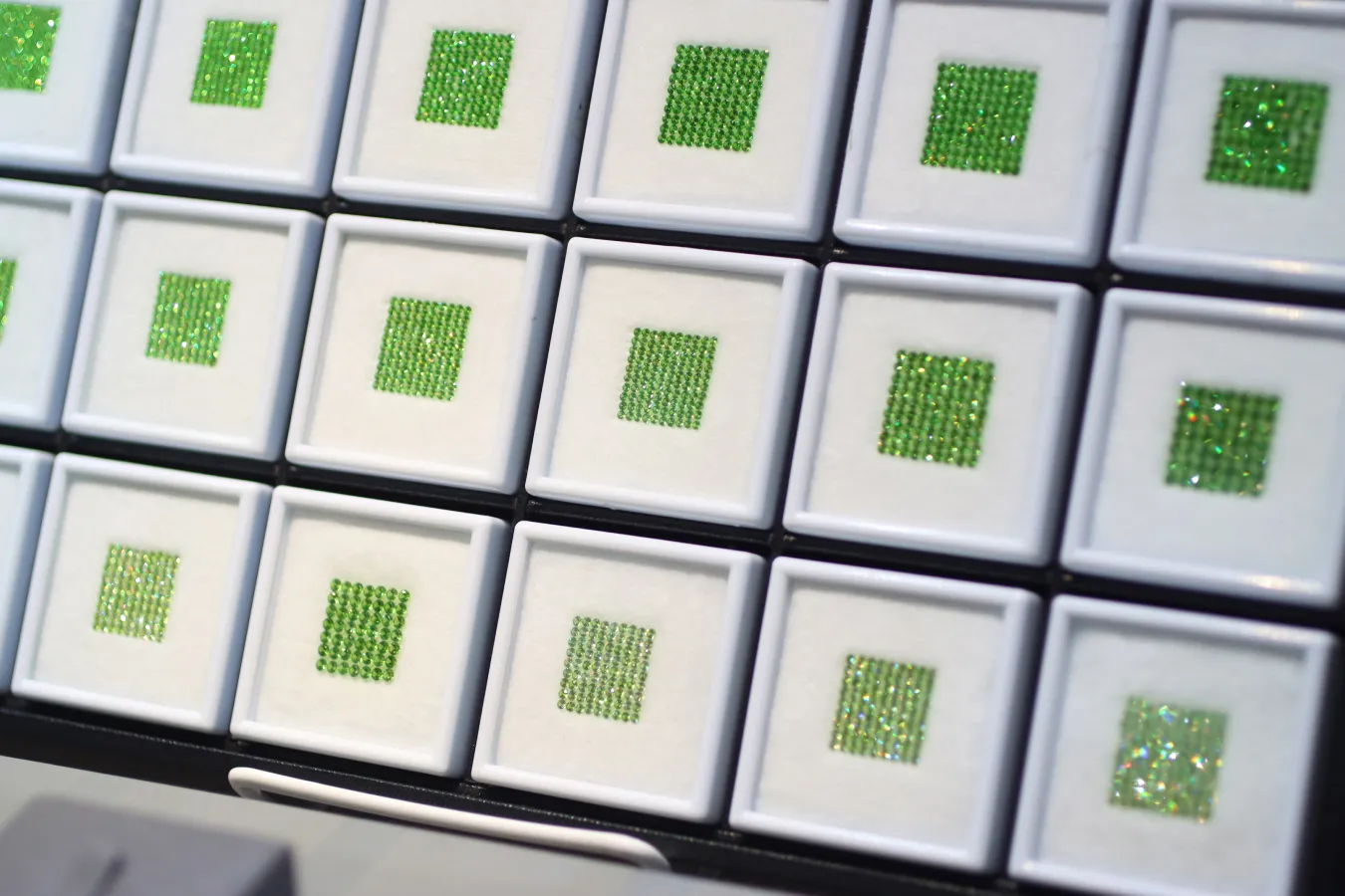 Russian demantoid garnet melee presented by Tsarina Jewels