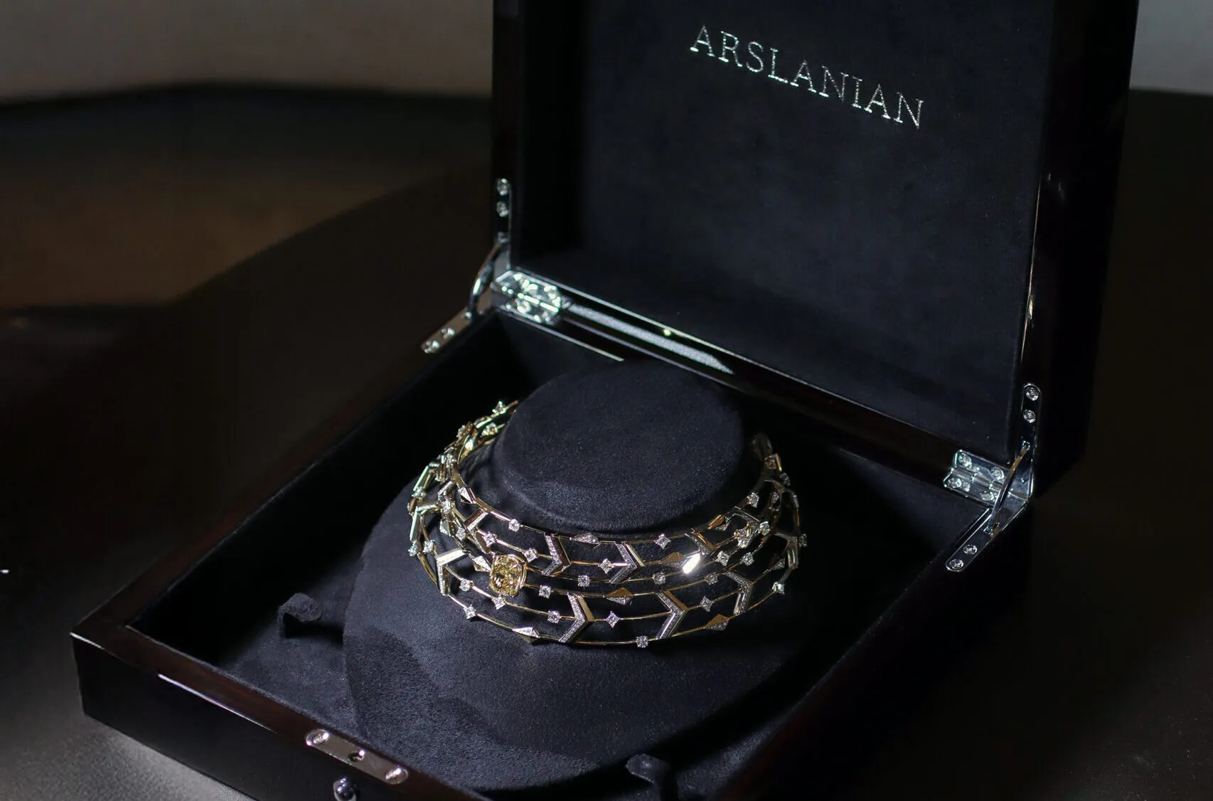 Sahag Arslanian Celestial Radiance High Jewellery choker with a 10.26-carat cushion-cut fancy deep brownish yellow VS2 diamond, 5.04 carats of princess-cut white diamonds, 5.49 carats of round white diamonds, and 4.83 carats of round white melee, set in 18k white and yellow gold 