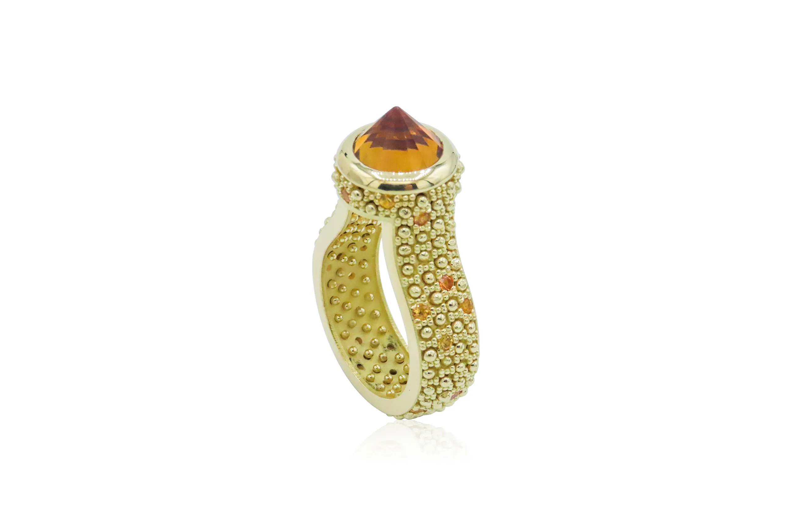 Salima Thakker ring with a reverse-set centre stone set in 18k yellow gold 