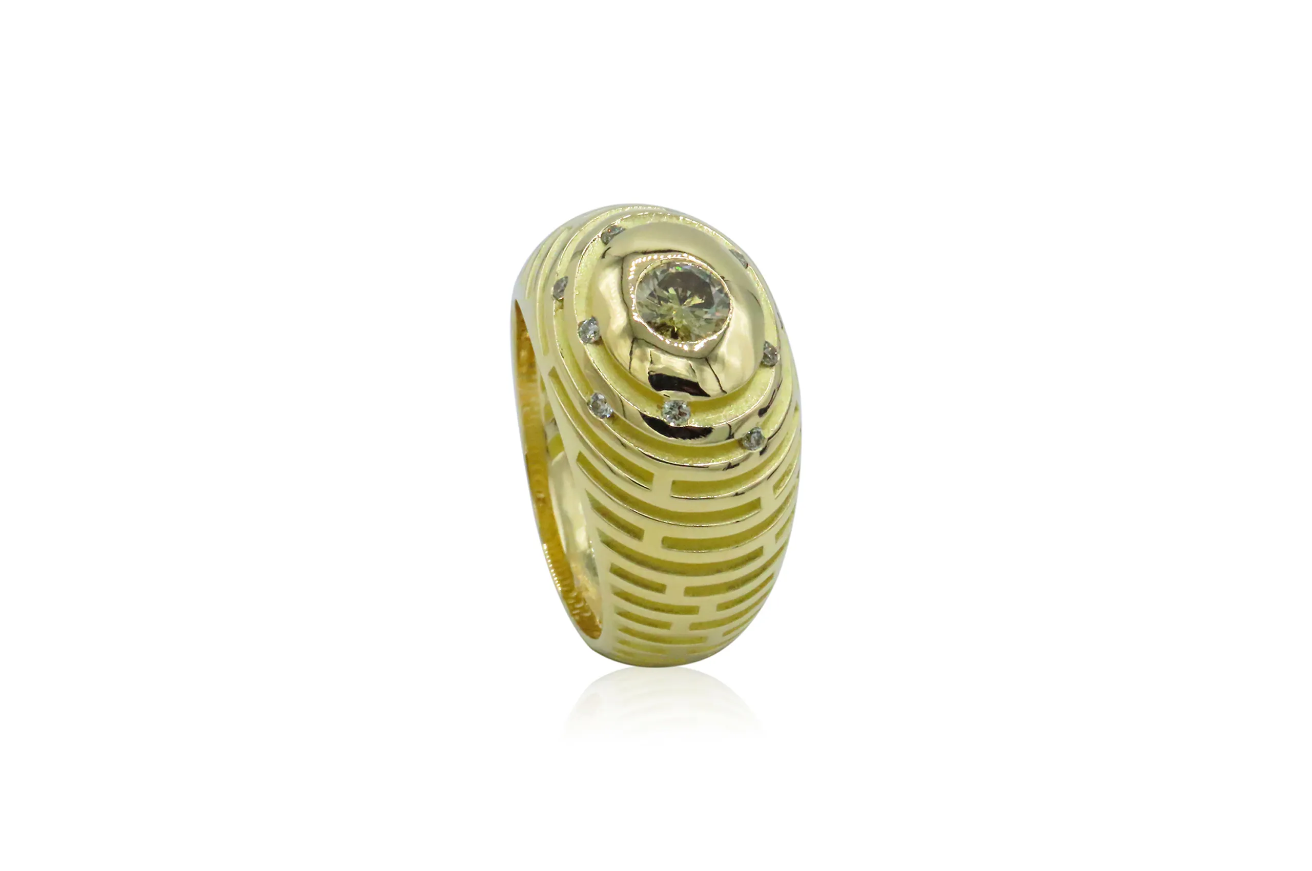 Salima Thakker Princess ring from the Labyrinth collection with green diamonds set in 18k yellow gold 