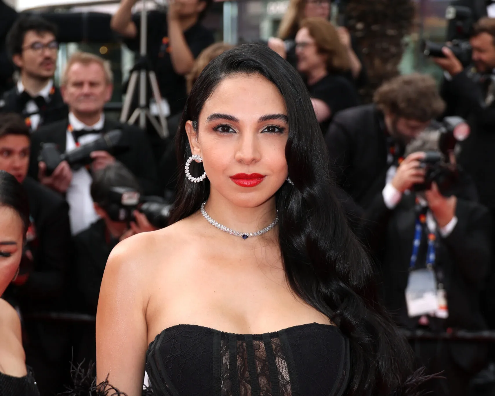 Egyptian actress Salma Abu-Deif wears Chopard high jewellery earrings and a necklace to the Cannes Film Festival 2025
