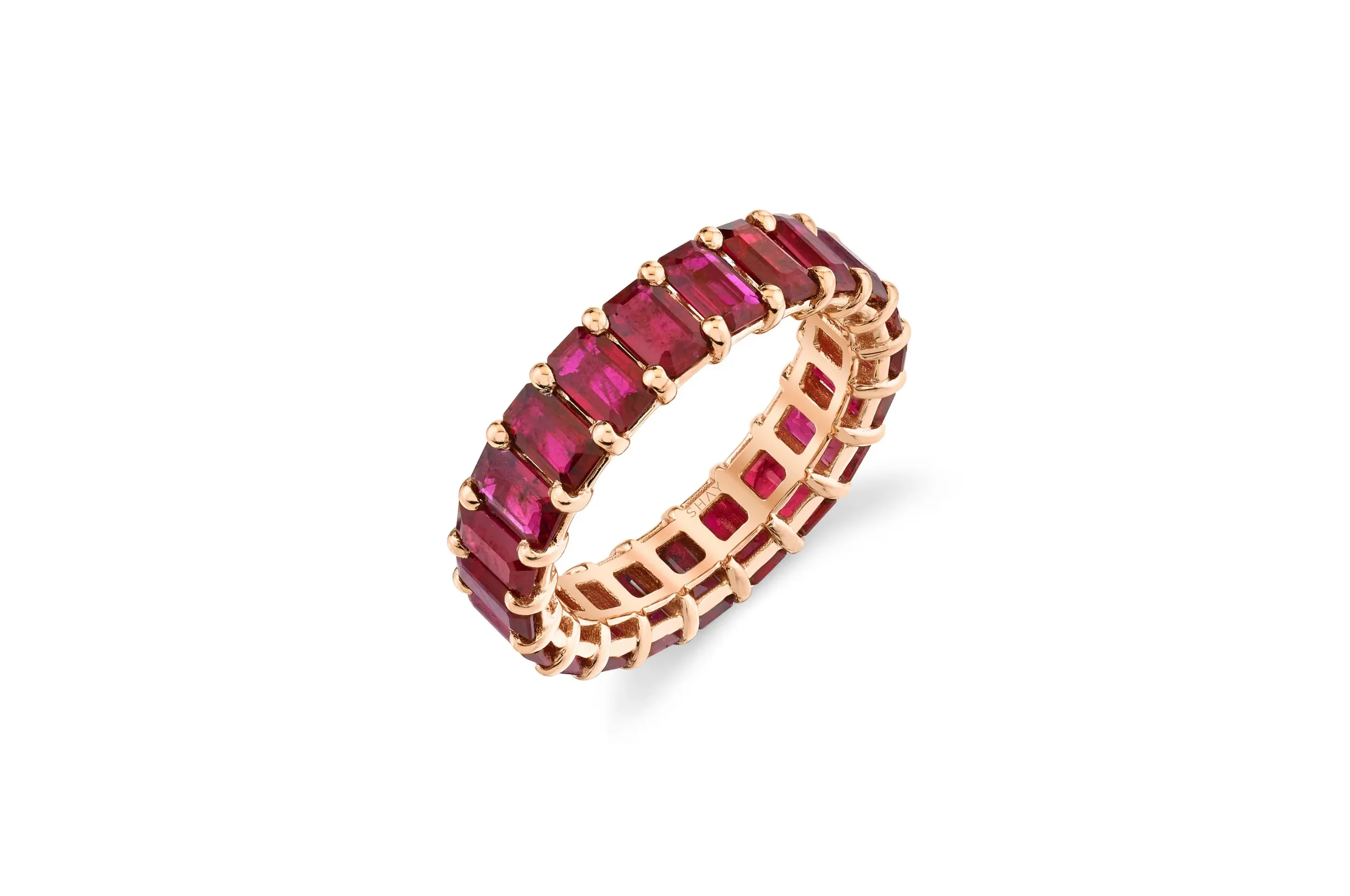 Shay's ruby eternity band in 18K rose gold showcases a gemstone that has long been a symbol of love and passion. 