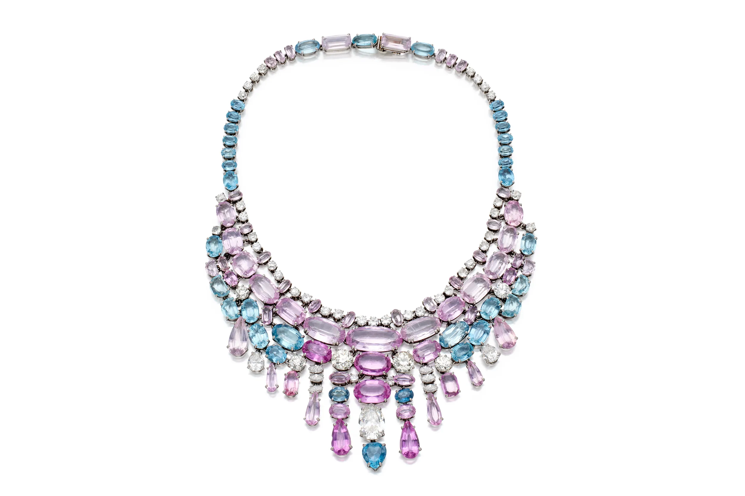 <p>Suzanne Belperron bib necklace featuring pink topazes, morganites, and aquamarines in oval, pear, and cushion cuts, accented with marquise, pear, old European-cut, and round diamonds</p>
