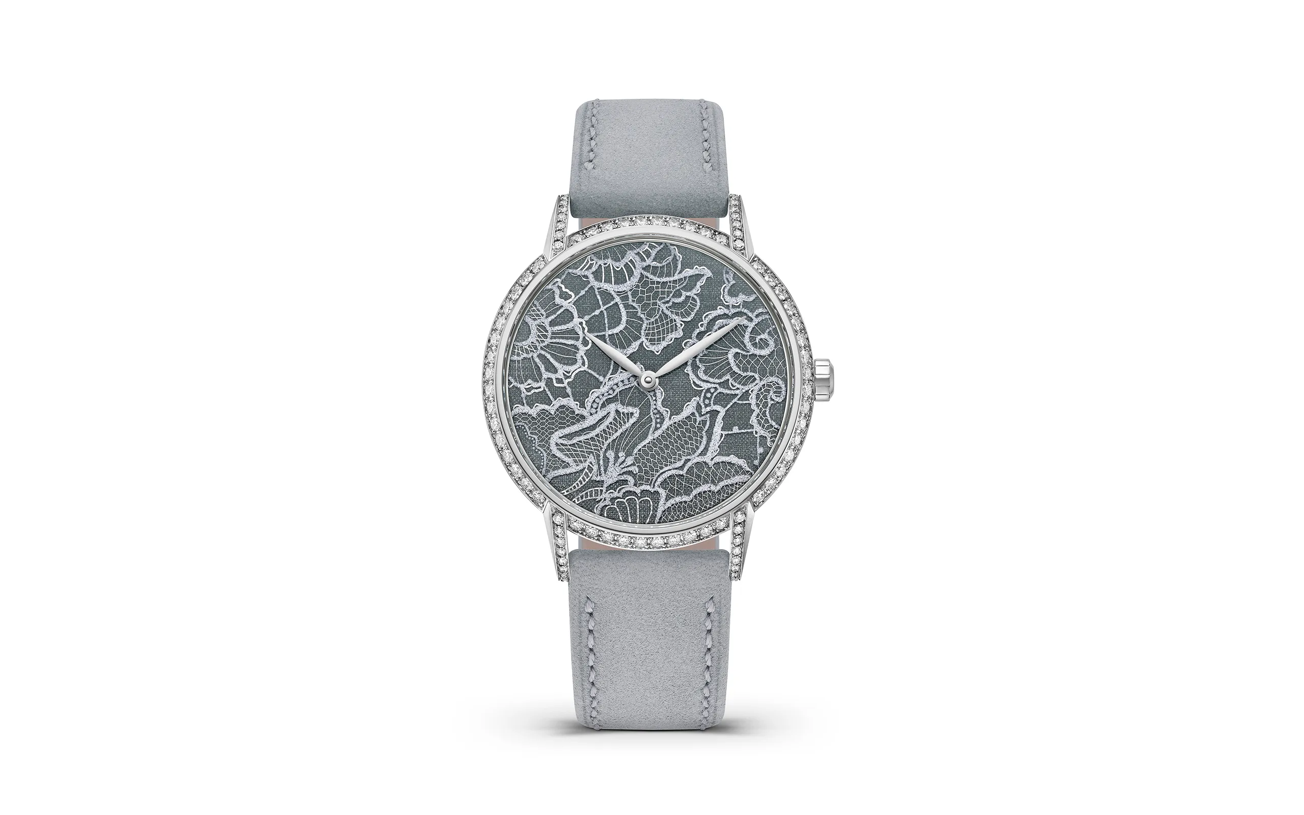 The TAOS Dentelle timepiece features diamonds across the bezel and lugs and a soft grey leather strap to enhance its feminine aesthetic 