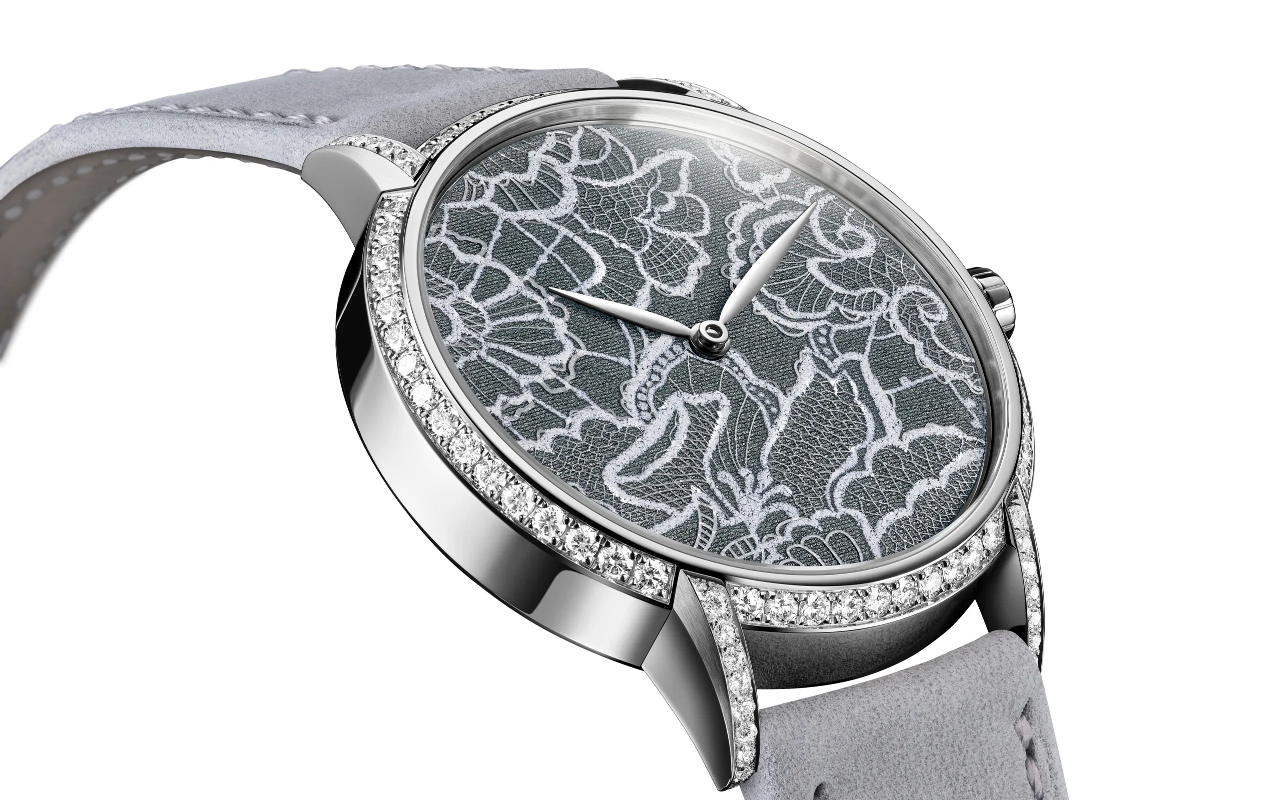 A closer look at the dial of the TAOS Dentelle timepiece with an appearance inspired by the precious Swiss laces of Saint Gall 