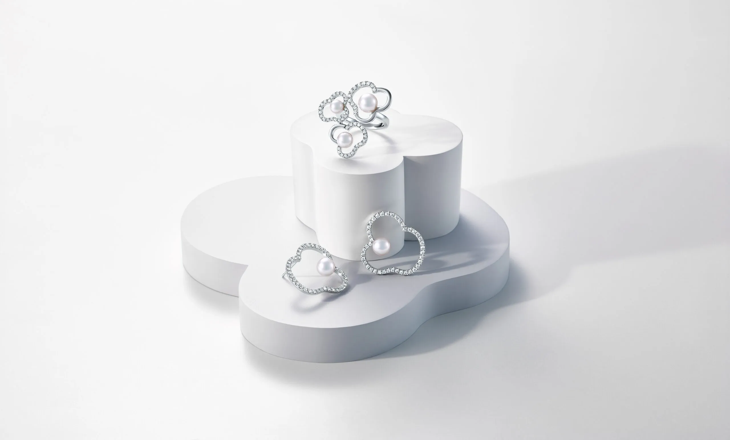 Tasaki Chants diamond pave ring and earrings in white gold, featuring Akoya pearls