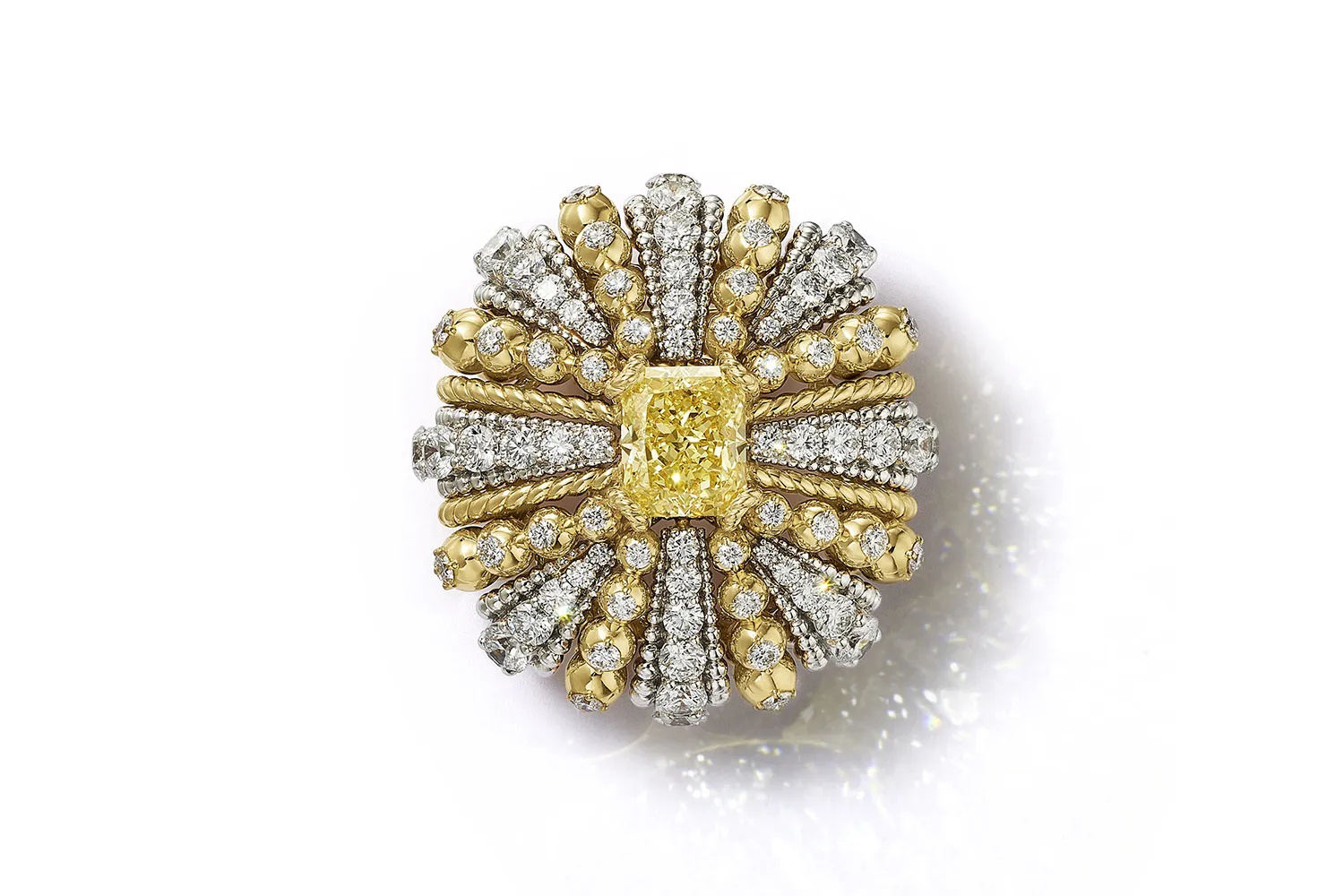 Tiffany & Co. Urchin ring with a fancy intense yellow diamond of over 9 carats set in 18k yellow gold and platinum, surrounded by white diamonds, from the Sea of Wonder Blue Book 2025 High Jewellery collection 