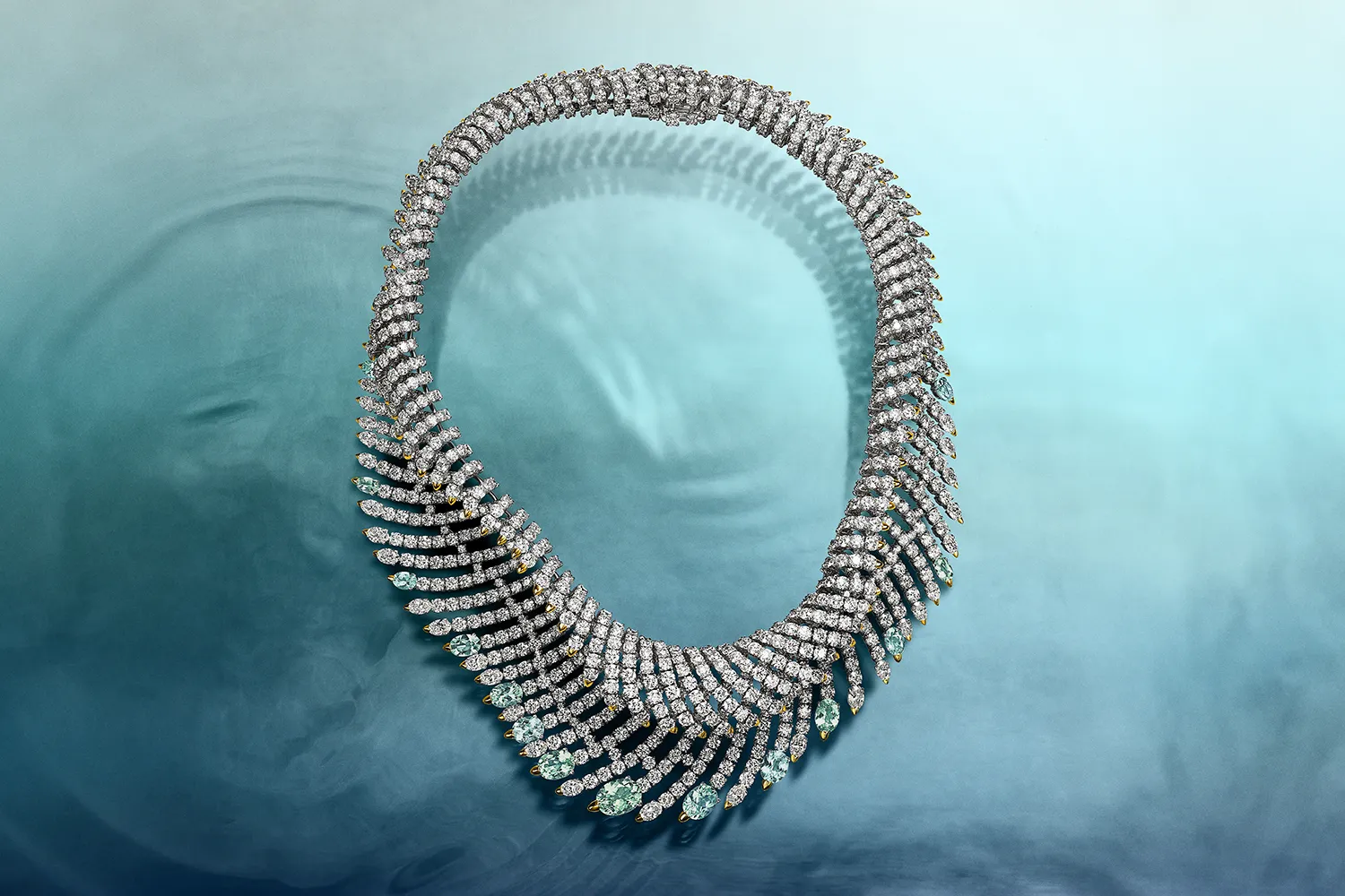 Tiffany & Co. Bioluminescence Wave necklace with green cuprian elbaite tourmalines of over 10 total carats, blue cuprian elbaite tourmalines of over 6 total carats and diamonds set in 18k yellow gold and platinum, from the Sea of Wonder Blue Book 2025 High Jewellery collection 