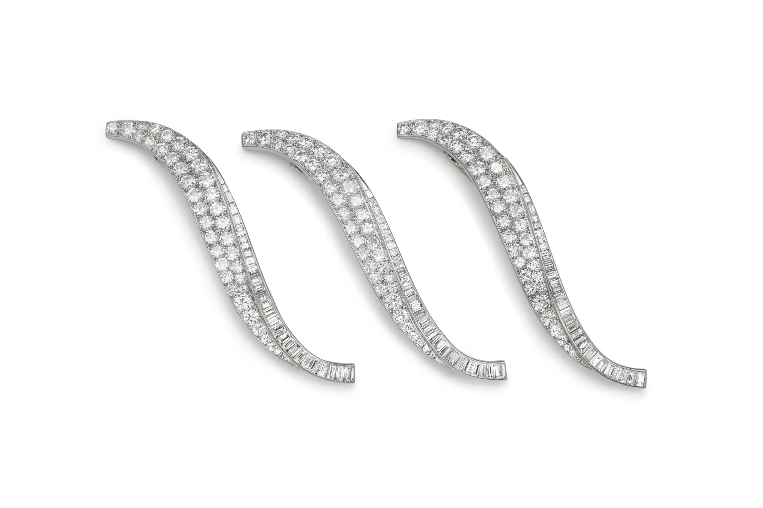 Véronique Bamps will present these Van Cleef & Arpels Flammes brooches/ hairpins in platinum set with diamonds (c. 1960) at TEFAF Maastricht 2025