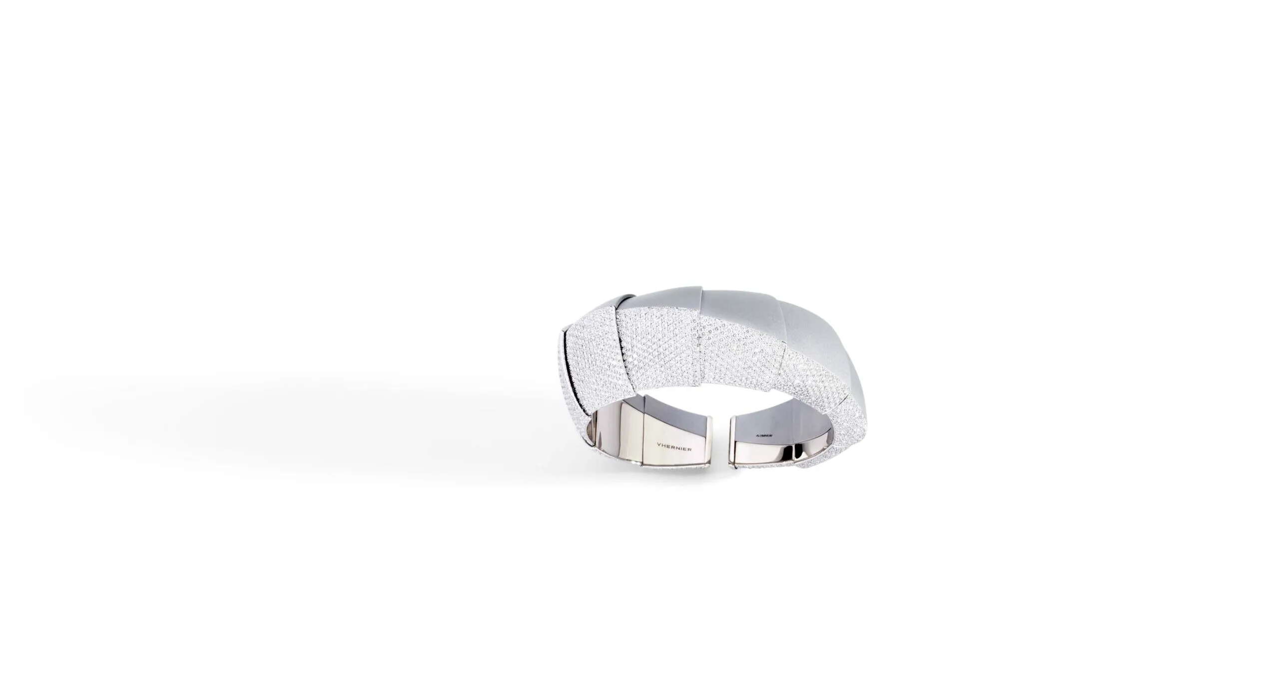 Vhernier Profilo di Luna bracelet from the Ardis High Jewellery collection with 1,387 diamonds weighing 10.55 carats, crafted in 18k white gold and aluminium 