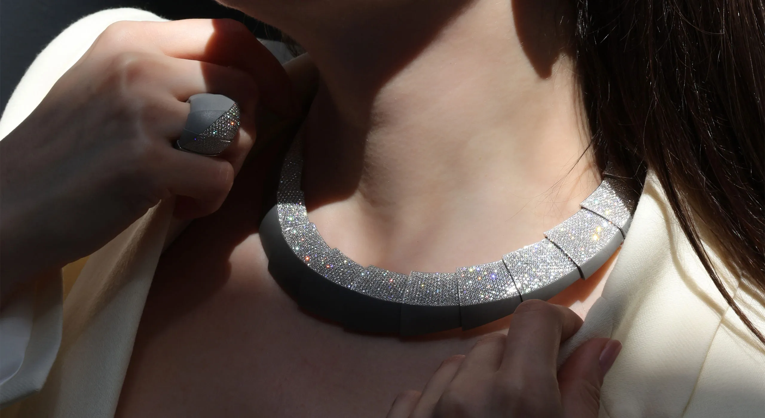 Katerina Perez wears the Vhernier Profilo Del Vento necklace and ring from the Ardis High Jewellery collection, set with diamonds in matte 18k white gold