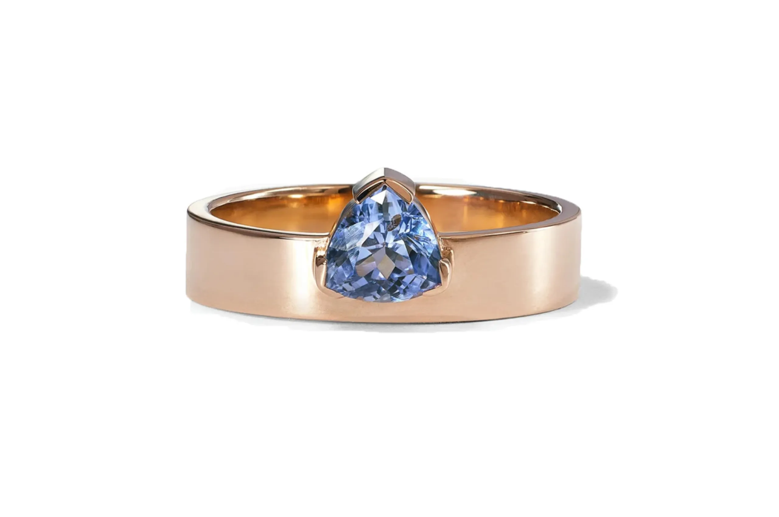 Inject some colour into your promise ring with WWake's trilliant cut sapphire Monolith ring in 14K recycled yellow gold.