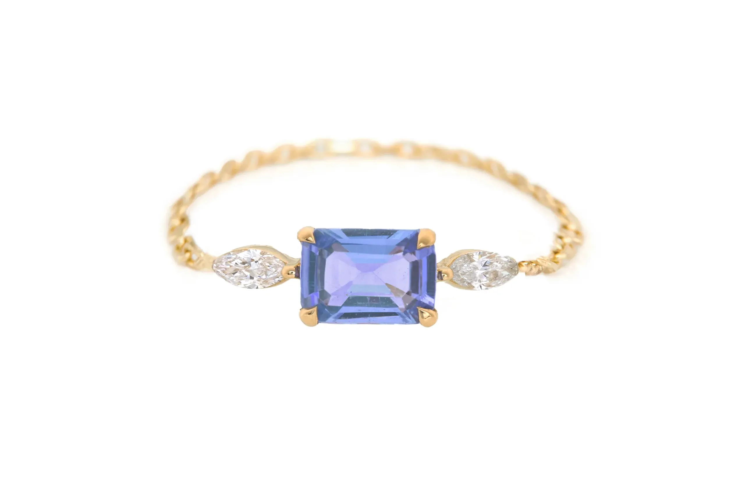 Yi Collection's Tanzanite Dream Chain ring is the ideal choice for a birthstone promise ring if your partner was born in December.