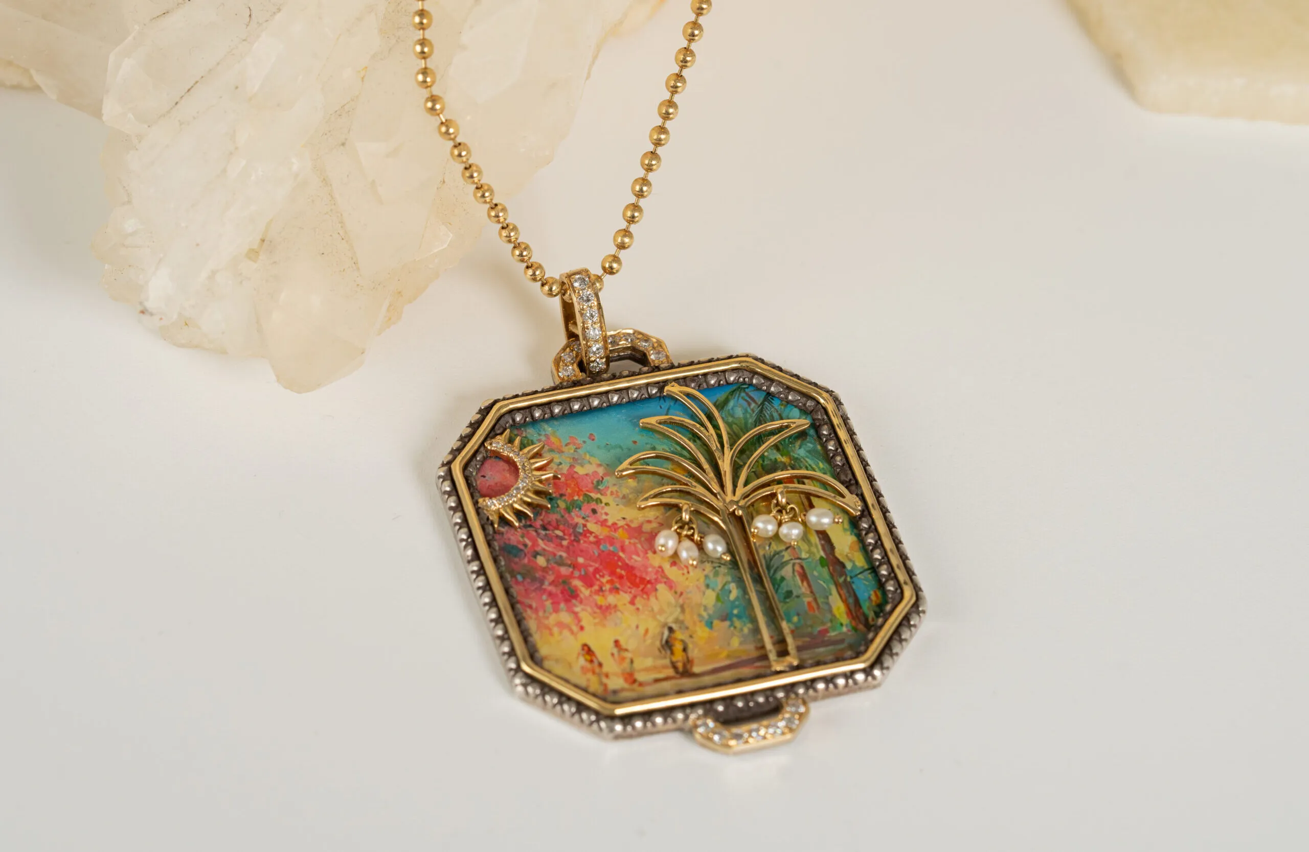 Kyan Jewelry Blooming Beauty necklace in collaboration with Bahraini artist Abbas Almosawi with natural Bahrain pearls and champagne diamonds surrounding a hand-painted artwork in 18k gold 