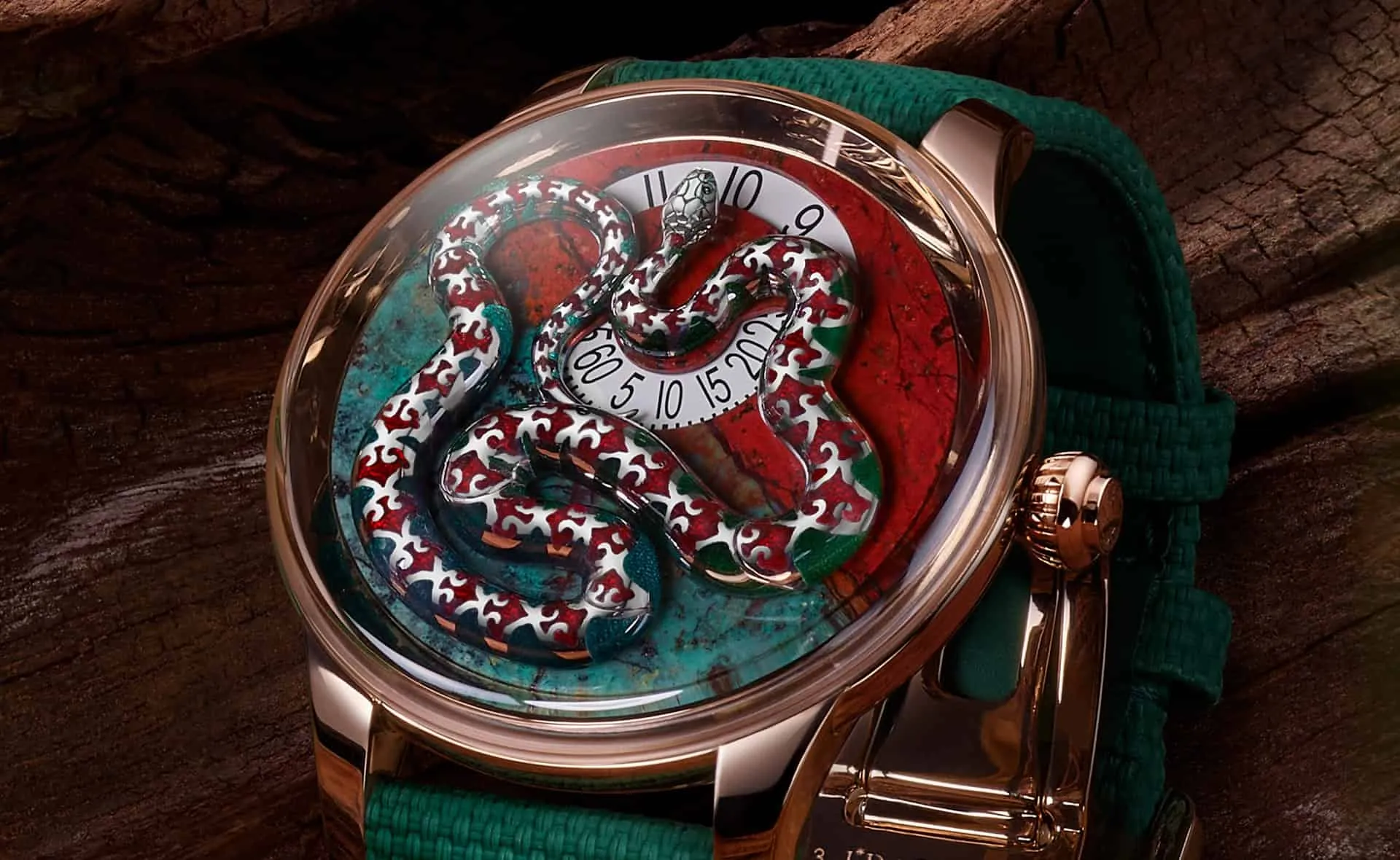 The Jaquet Droz Ophidian Hour watch with a Sonora Sunrise (chrysocolla cuprite) dial and a red enamel snake in white gold