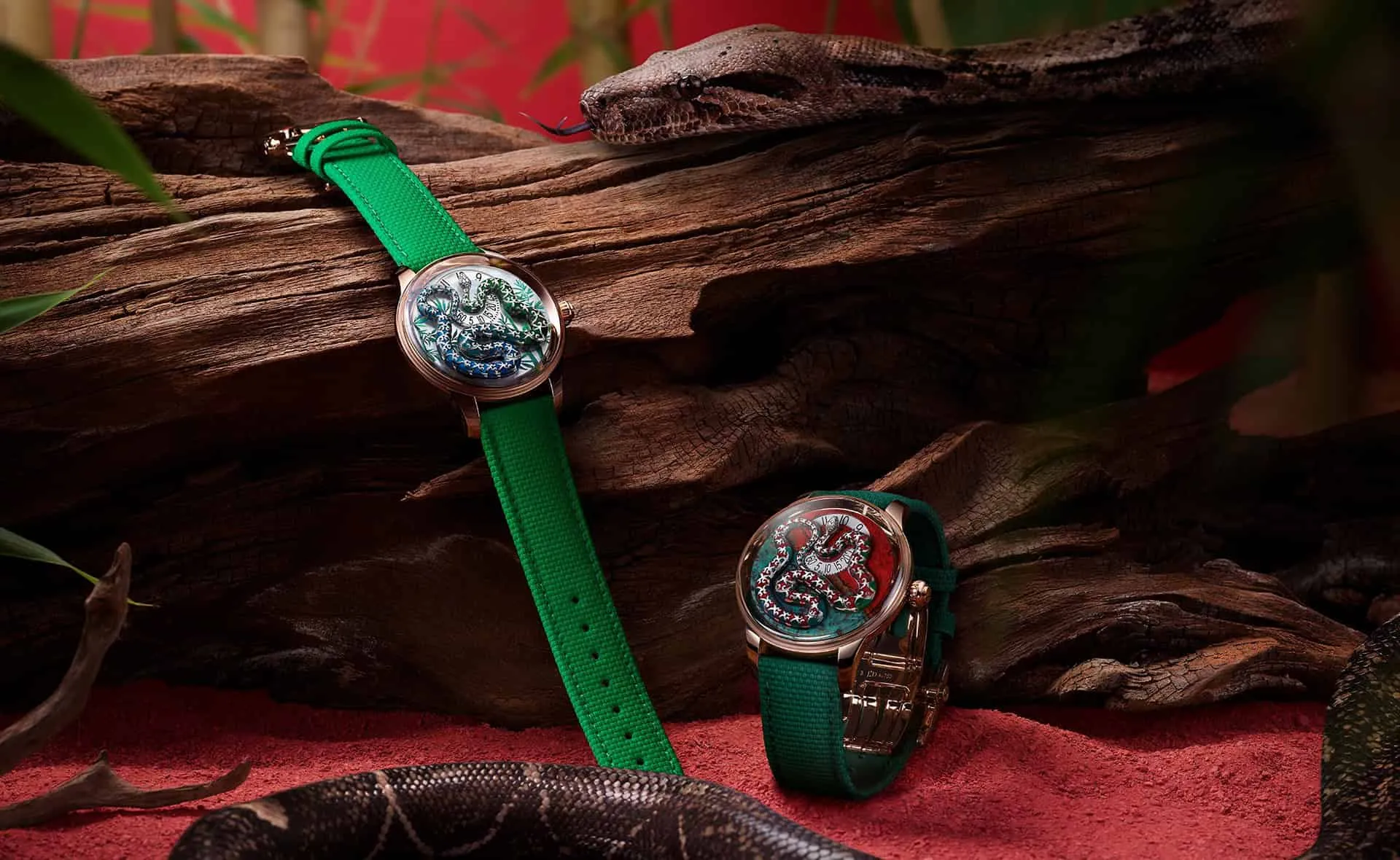Jaquet Droz Ophidian Hour watch with a green enamelled snake on hand-painted mother-of-pearl with a bright green strap (left) and a red enamelled snake on Sonora Sunrise (chrysocolla cuprite) with a forest green strap, both created for the Year of the Snake