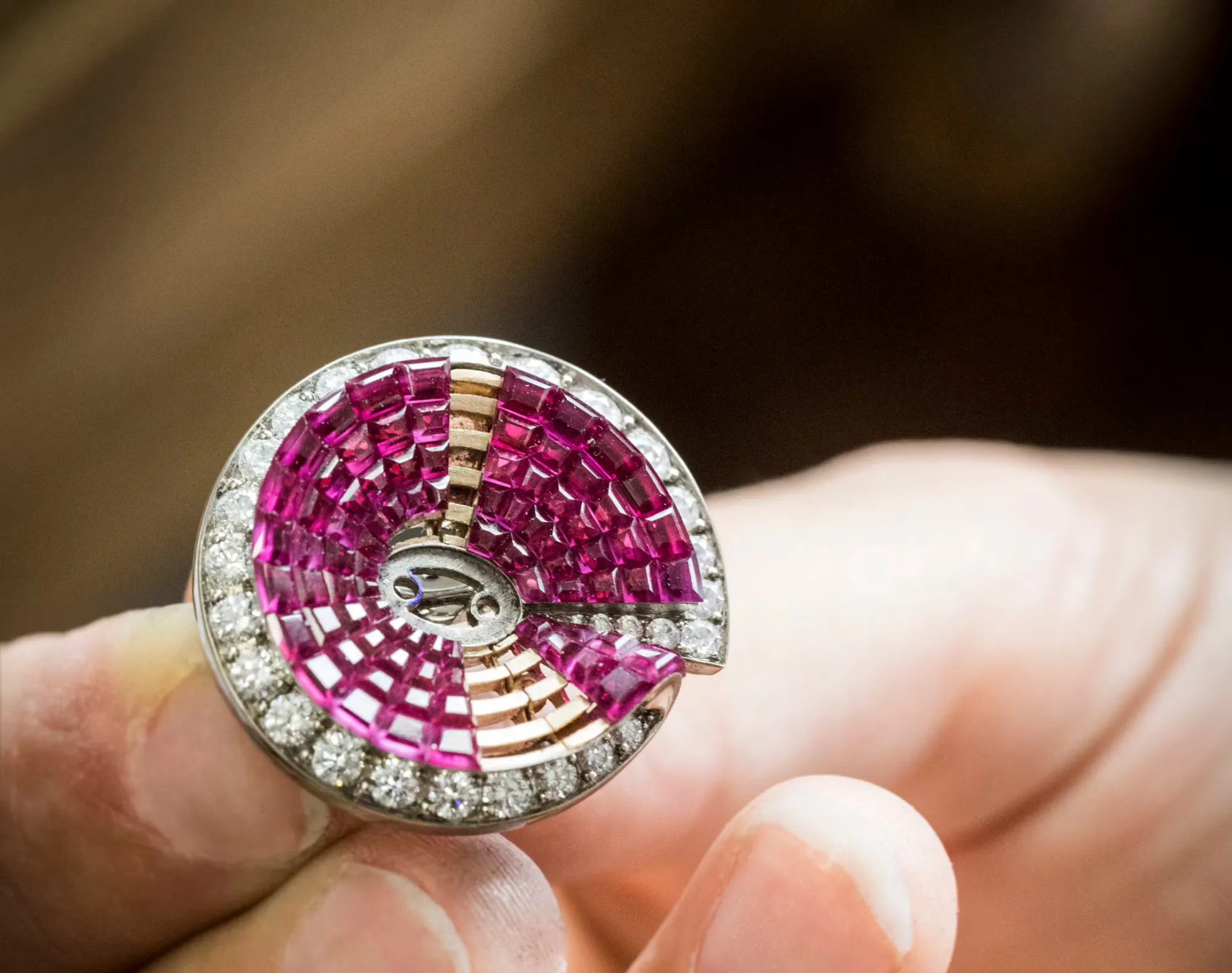 The rubies are individually set to completely cover the surface of this earring