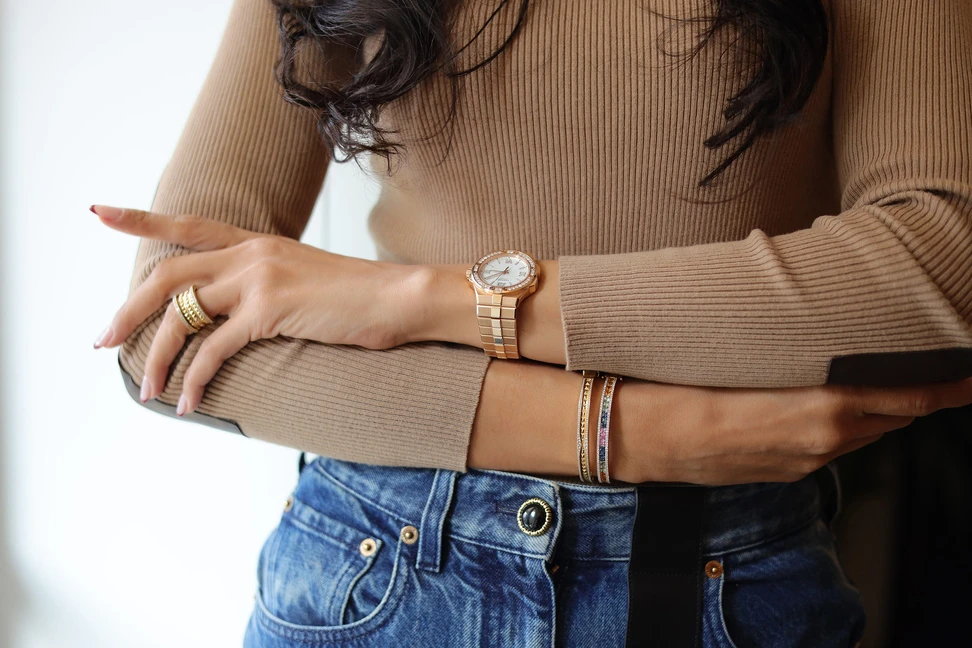 <p>Model Farnoush Hamidian showcases a ring, a watch and two stacking bracelets that are part of her personal jewellery collection</p>
