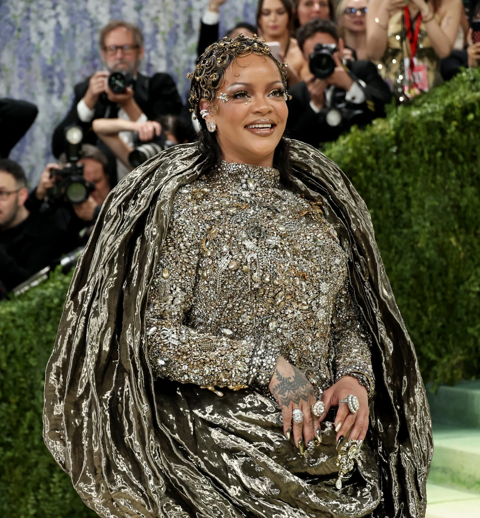 <p>Rihanna’s Maison Margiela gown incorporated antique jewels and chains, with her ears laden with diamonds, including a Dyne by Sarah Ysabel Narici ear cuff and Old Mine desert diamond earrings by Glenn Spiro</p>