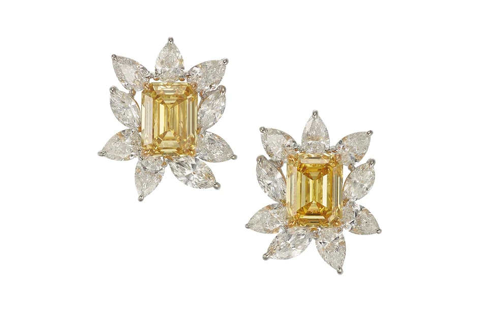 <p>A pair of fancy deep yellow diamond earrings of 7.55 carats and 7.51 carats</p>
