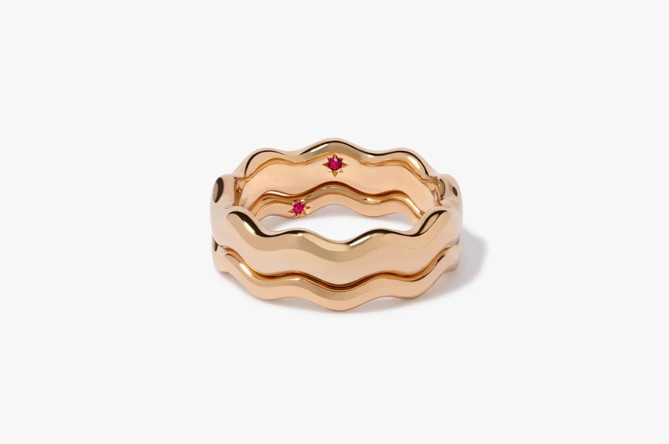 <p>Set with a tiny ruby inside symbolising love, Annoushka&#8217;s playful Whoopsie Daisy rings in 18K yellow gold are available in different widths.</p>
