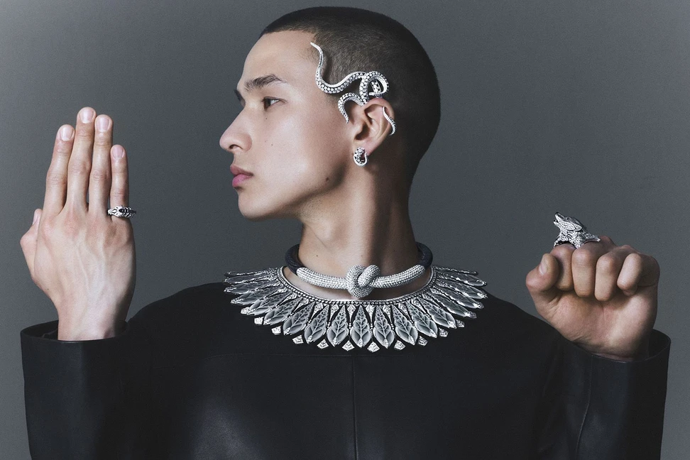 <p>Boucheron mother-of-pearl, diamond, meteorite, onyx, platinum, burnt wood and white gold Octopus earring, Bois Brûlé Diamant necklace, Coquillage necklace and wolf ring from the Carte Blanche Ailleurs High Jewellery collection</p>
