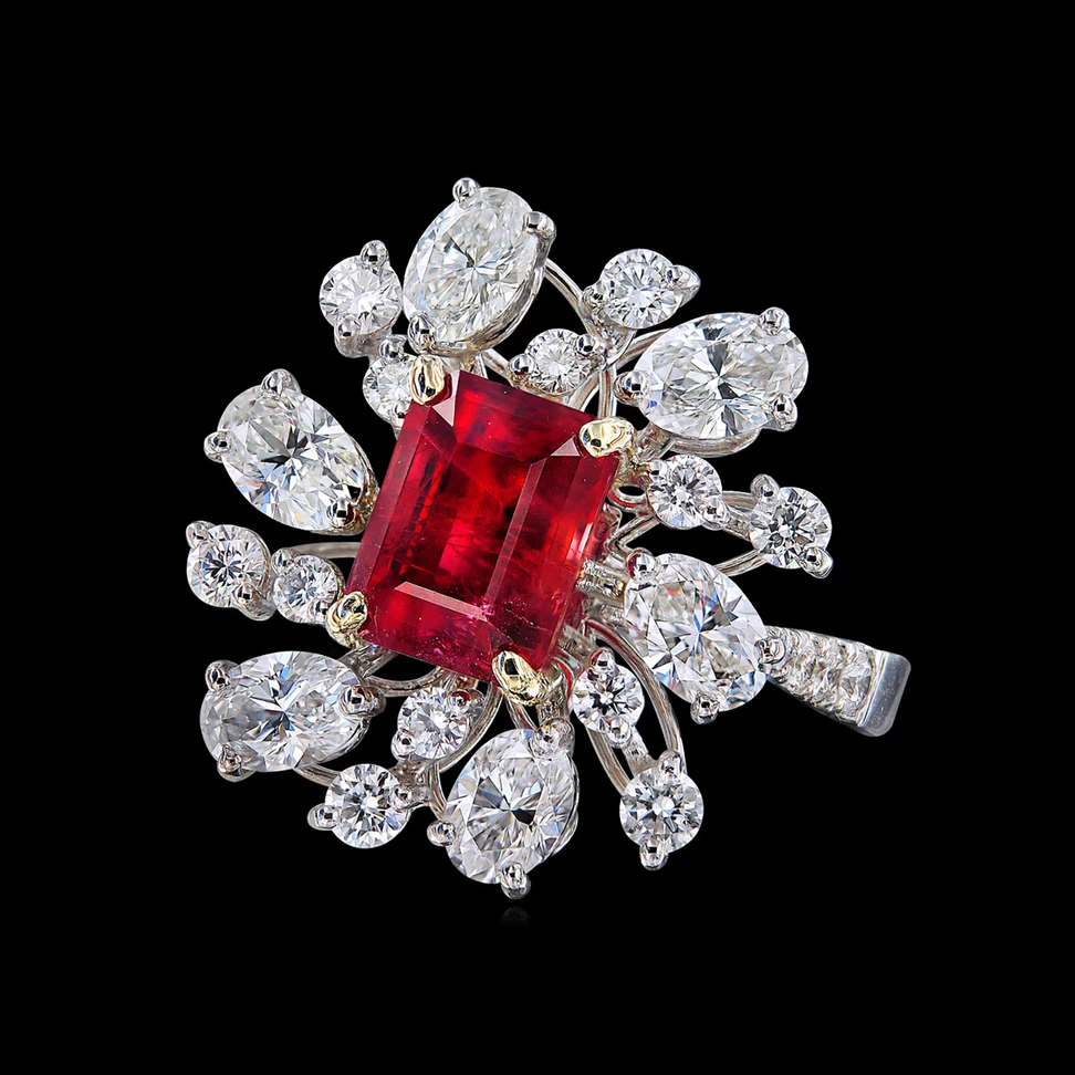 <p>Caratell 2.20ct Bixbite – Red beryl and 2.32ct Diamond cocktail ring from ‘Sun Ray’ collection</p>