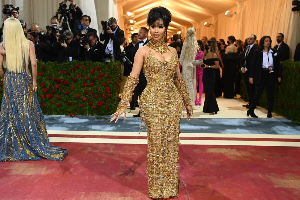 <p>Cardi B wearing a golden choker necklace by Versace to the Met Gala 2022. Photo credit: The New York Times</p>