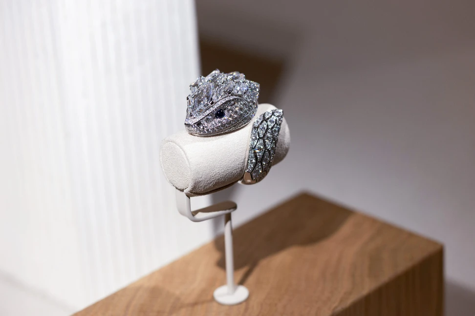 <p>Cartier ring with a 2.21-carat modified hexagonal-shaped step-cut diamond, 15 modified hexagonal-shaped diamonds, sapphires, and brilliant-cut diamonds set in 18k white gold, part of the En Équilibre High Jewellery collection</p>
