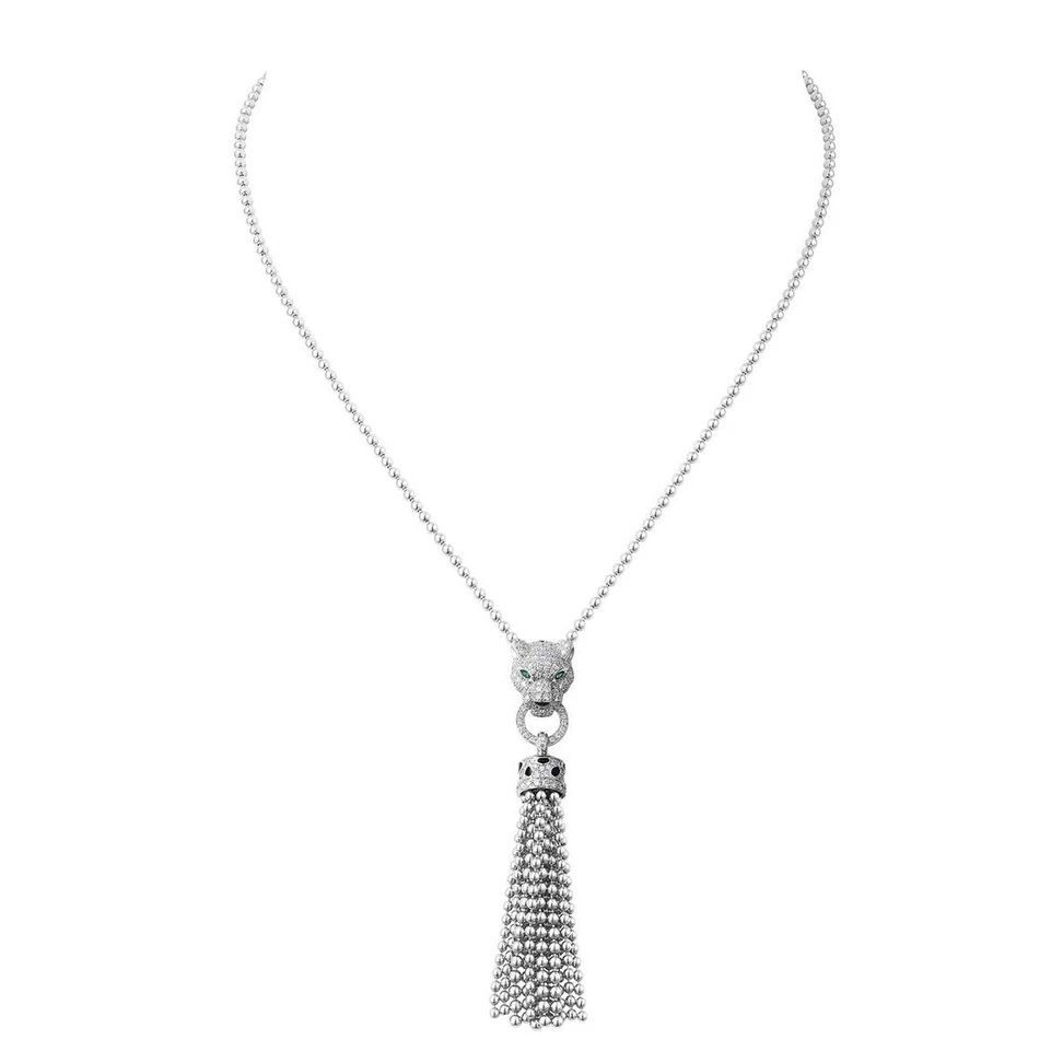 <p>Cartier Panthère de Cartier tassel necklace in white gold and diamonds with black lacquer, emeralds and onyx</p>