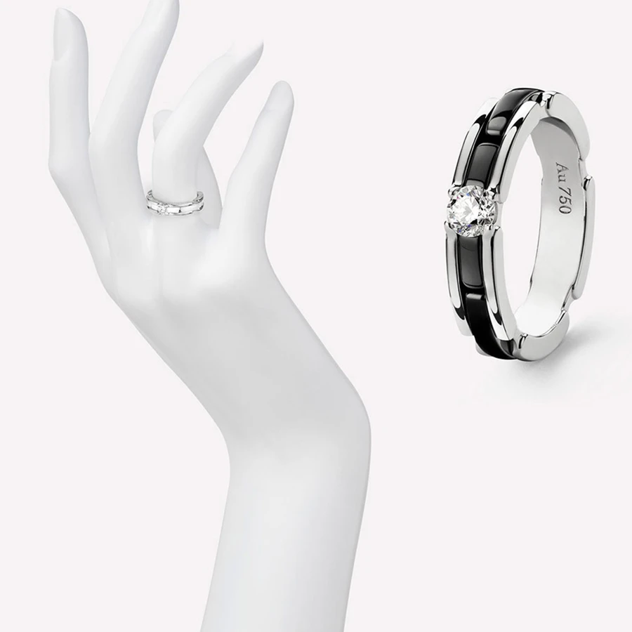 <p>Chanel ‘Ultra’ white gold diamond solitaire engagement rings with ceramic detail</p>
