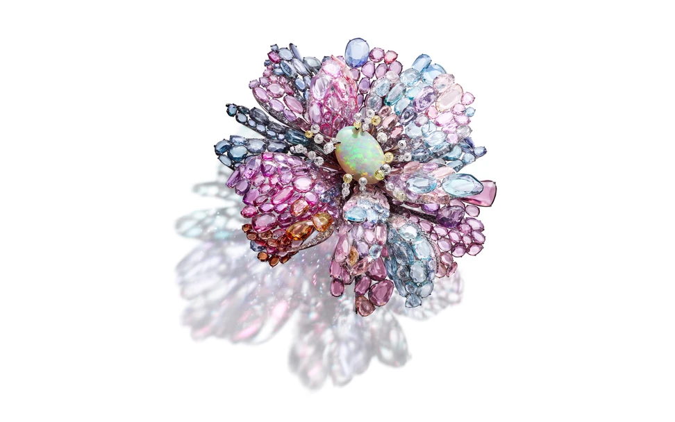 <p>Feng J Comme moi (Like me) brooch with a 25.67-carat Australian opal and petals composed of more than 1,200 gemstones, including diamonds, rubies, spinels, sapphires, tourmalines, aquamarines and tanzanites to be presented at TEFAF Maastricht 2025</p>
