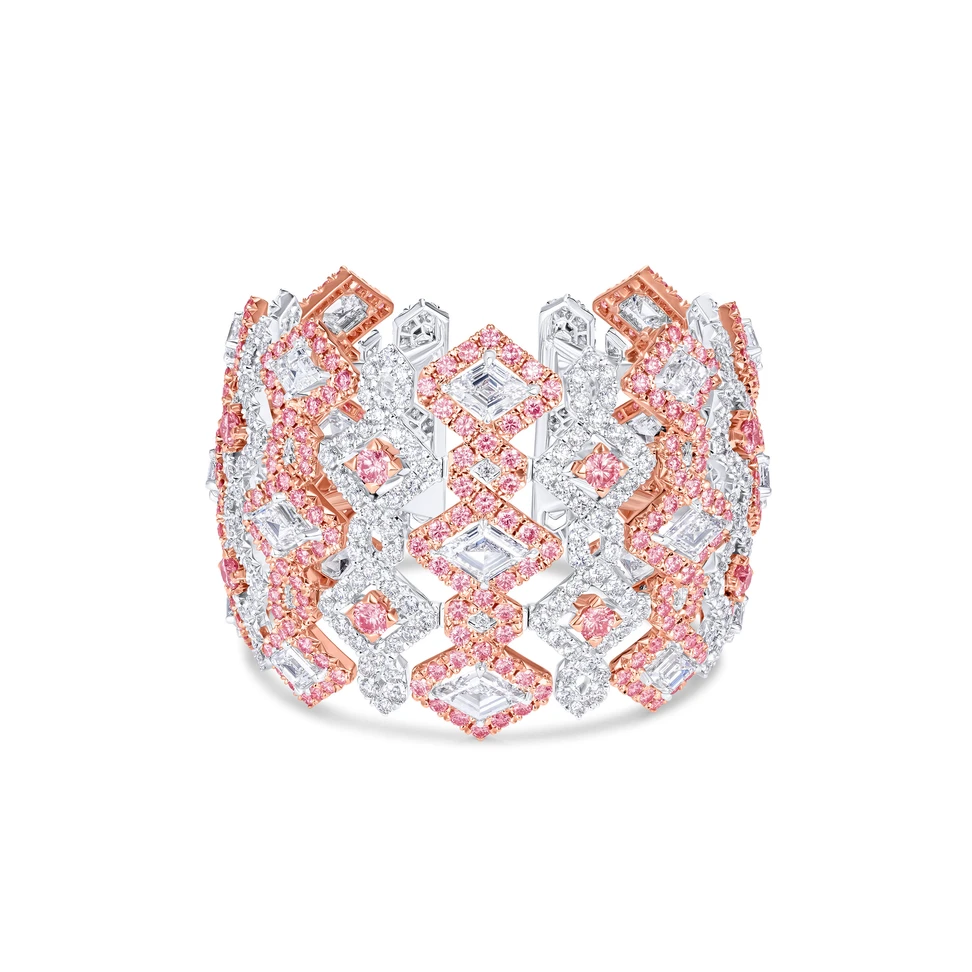 <p>Prisma High Jewellery cuff with 15.06ct of round pink diamonds, 20.26ct of lozenge shape white diamonds and 11.68ct of round white diamonds set in 18ct rose and white gold</p>
