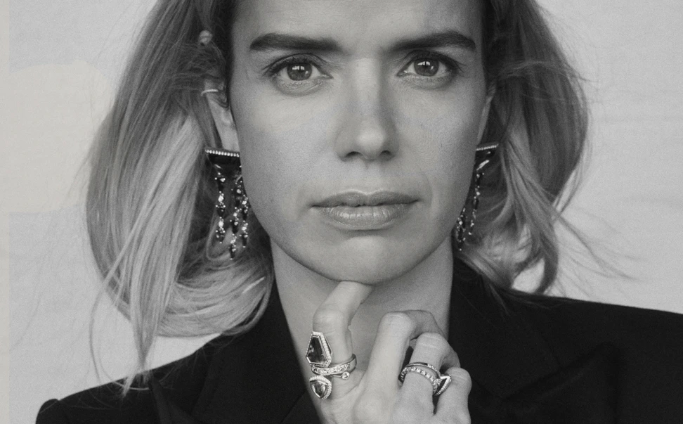 <p>Designer Sabine Roemer wearing a selection of her Superwoman rings</p>