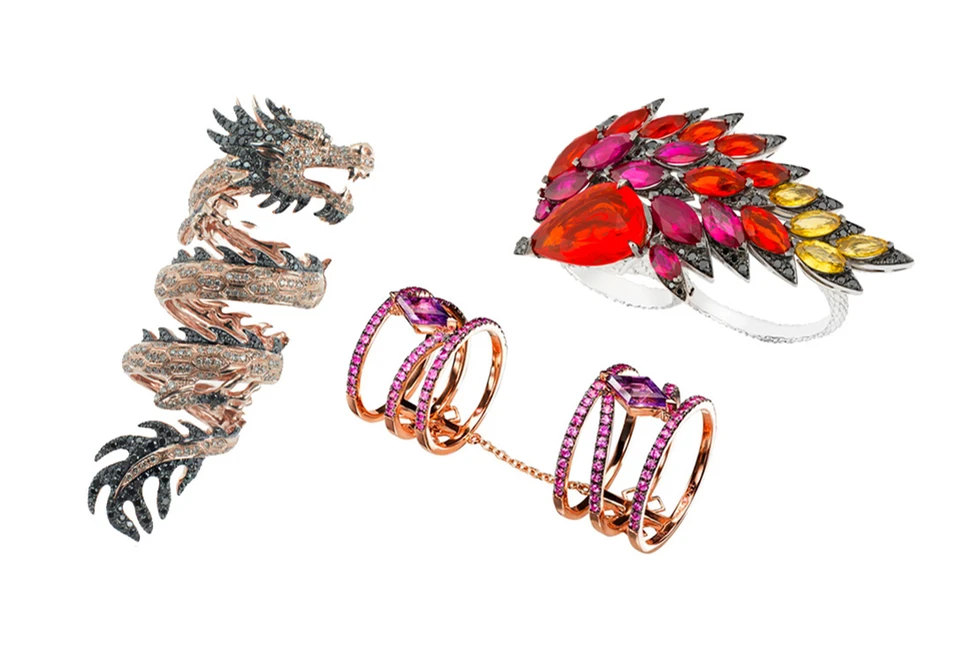 <p>From left to right: Elise Dray Dragon full-finger ring in rose gold with black diamonds; Dionea Orcini Linee Misteriose double cage ring with pink sapphires and amethysts; Stephen Webster Magnipheasant two-finger ring</p>
