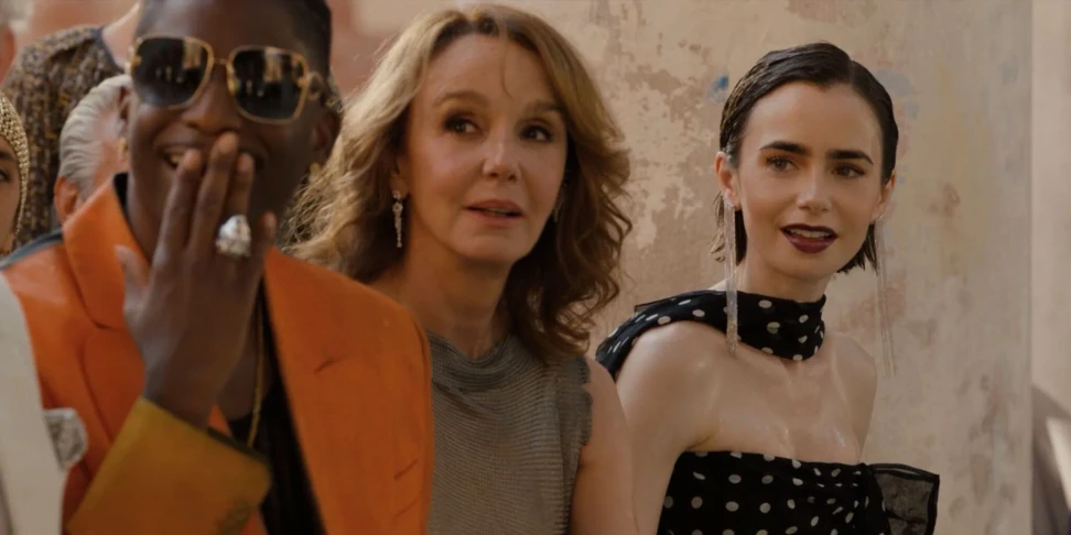 <p>Emily Cooper wearing the shoulder-grazing Chainfall earrings in 18k white gold by Guzema</p>