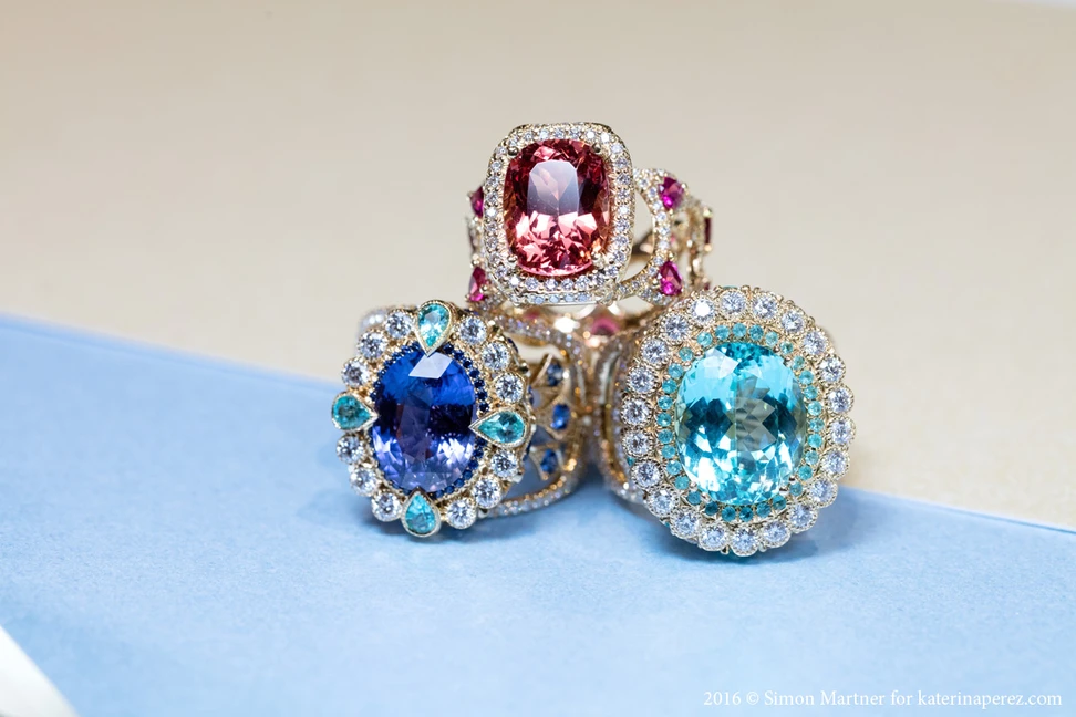 <p>Erica Courtney Empress ring with a 5.19 cts colour change sapphire, Bracelet ring with a 7.46 cts Paraiba tourmaline and Sayeda ring with 5.49cts spinel</p>
