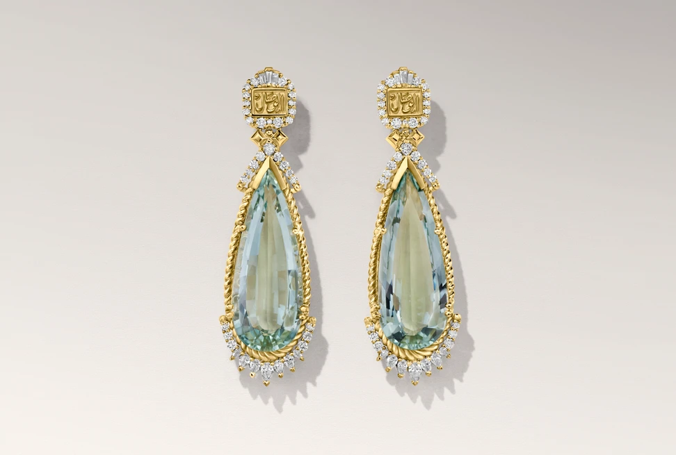 <p>Azza Fahmy Eternal Union earrings with 35.29 carts of pear-shaped aquamarines and baguette-cut diamonds in inscribed 18k yellow gold </p>
