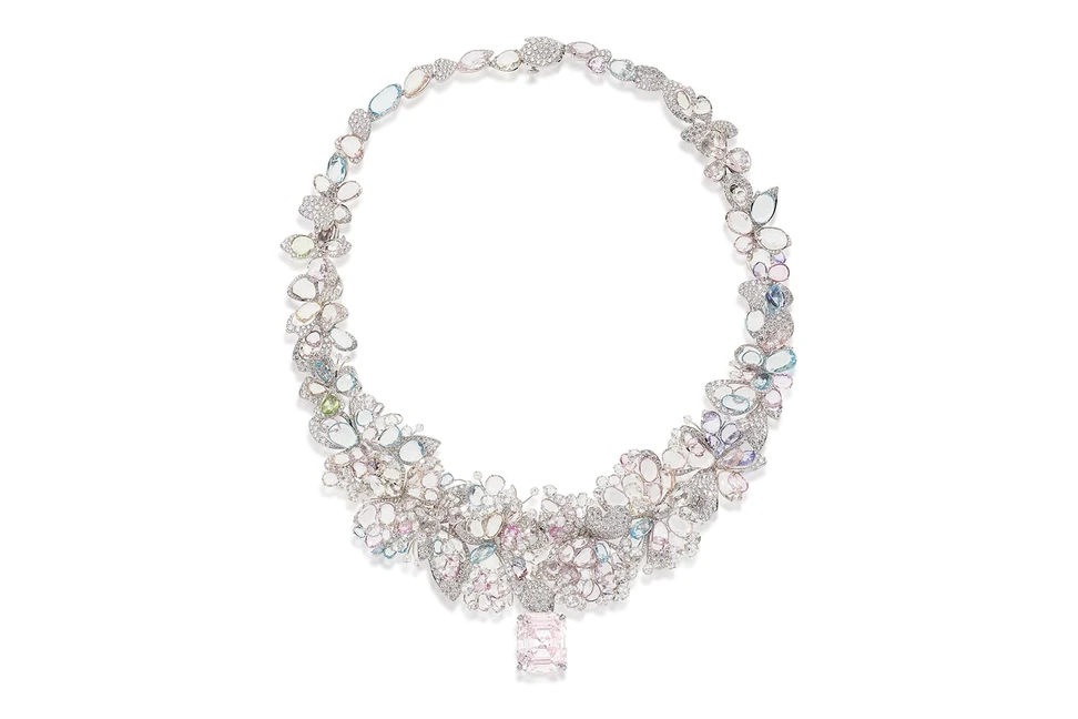 <p>Feng J’s Jardin de Giverny necklace is set with rose-cut sapphires, spinels, tanzanites and tsavorites in pale shades of blue, purple, rose and green alongside a spectacular centrepiece: a rare 19 carat fancy cut light pink diamond</p>
