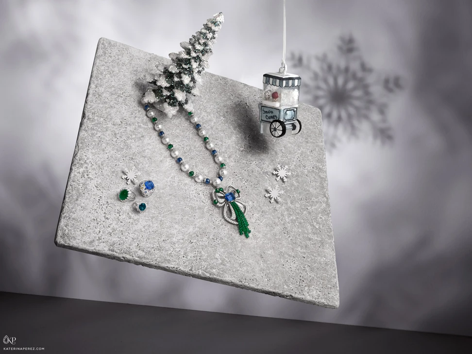 <p class="editorial_caption">Festa collection necklace with pearls, 19.31cts Sri Lankan sapphire, sapphire and emerald beads as well as diamonds by Bulgari; 13.44cts cabochon emerald ring with diamonds by Amrapali; Tsarina ring with a 8.10cts oval topaz and diamonds by Nadine Aysoy; Cushion-cut sapphire, multi-coloured sapphires and diamonds ring by Fabergé</p>
