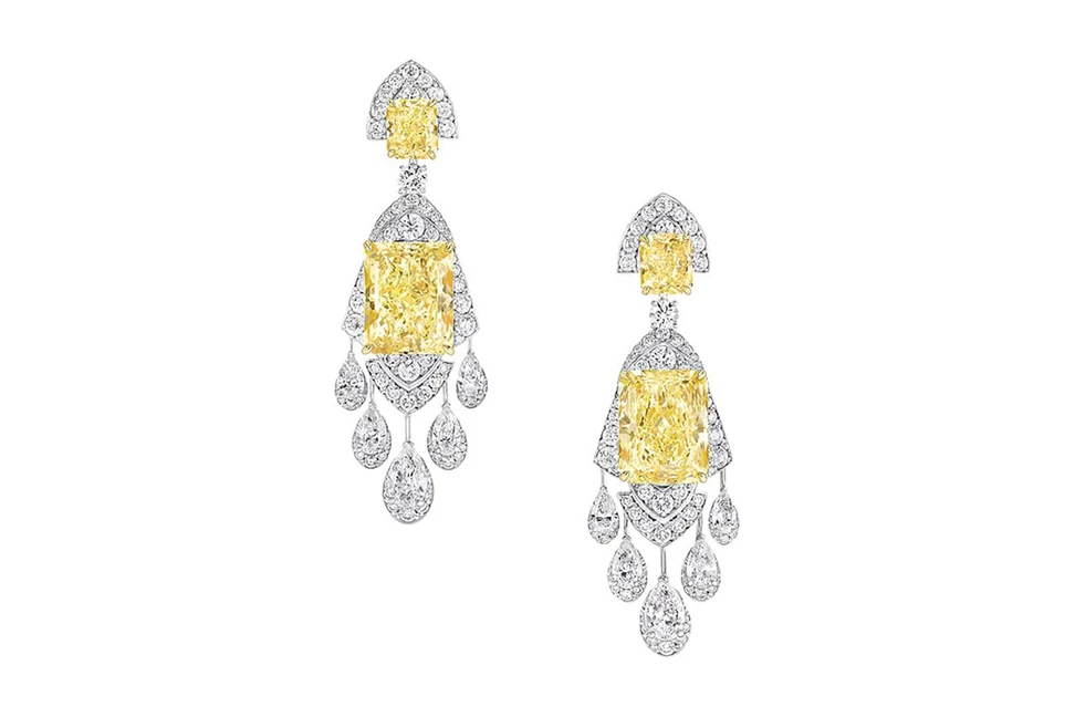 <p>The Girl Who Created The Stars earrings in white gold and diamonds featuring two 21-ct yellow diamonds from the Tribal High Jewellery collection</p>
