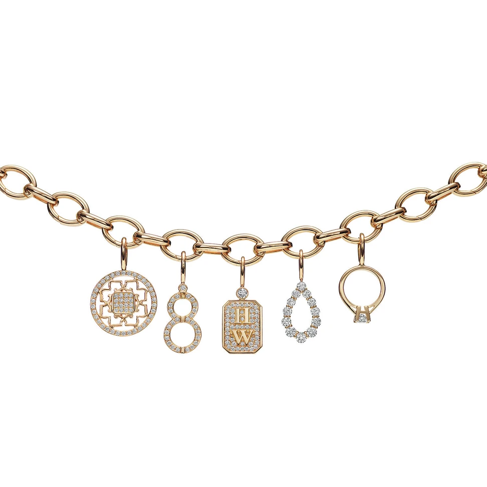 <p>Harry Winston charm bracelet in gold and diamonds</p>