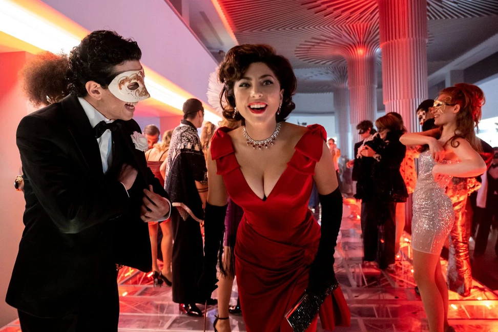 <p>In a scene set in a New York nightclub, Gaga’s Patrizia wears a contemporary Bvlgari High Jewellery necklace and earrings ablaze with pigeon’s blood rubies</p>

