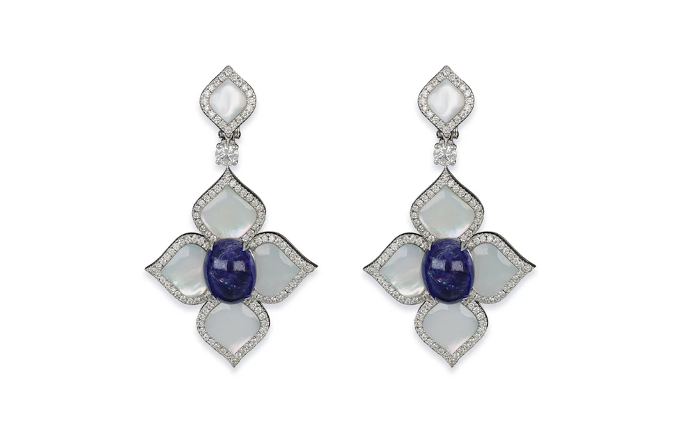 <p>J’OR Jewels earrings from the Harem collection with tanzanite cabochons, mother of pearl and colourless diamonds in 18k white gold</p>
