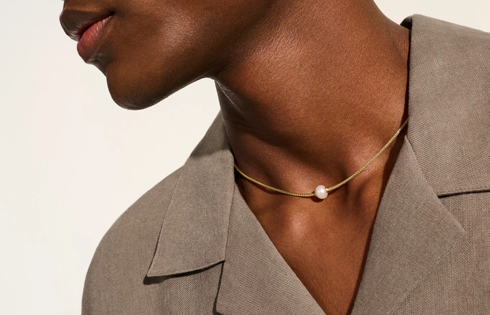 <p>John Hardy’s Essential Pearl necklace features the brand’s signature woven chain in reclaimed gold</p>