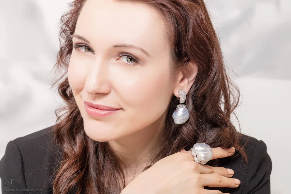<p>Katerina Perez in Assael baroque pearl and diamond earrings and ring</p>
